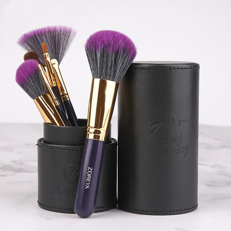 Daily makeup brush set with artificial fibre bristles and aluminium handles in black, brown, and pink