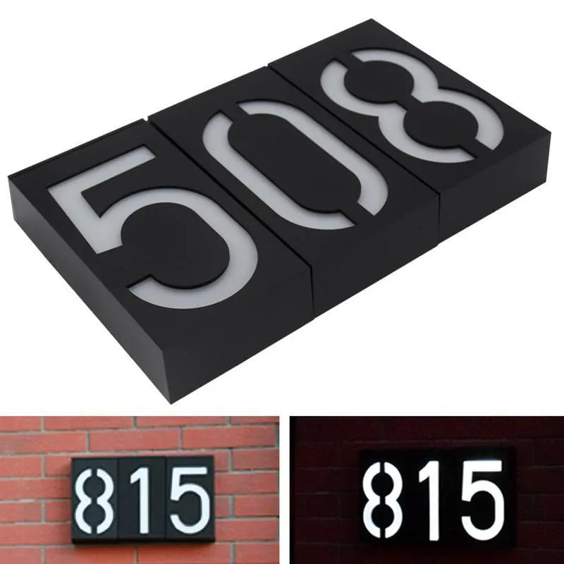 Solar powered outdoor house number light with large numeral, IP65 waterproof rating, and wall mount.
