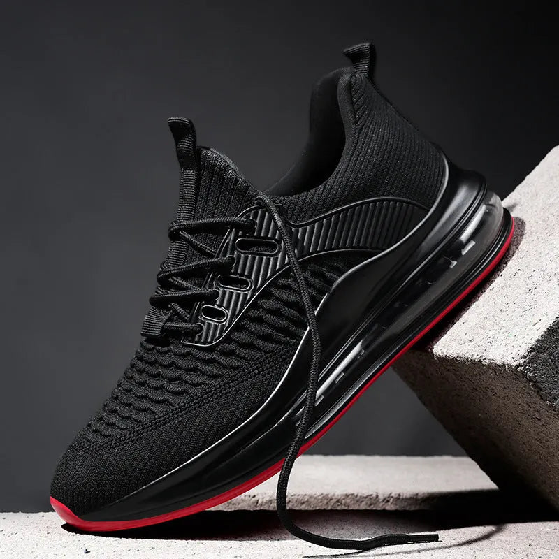 Men's black mesh running shoes with rubber sole and low-top design for sports activities