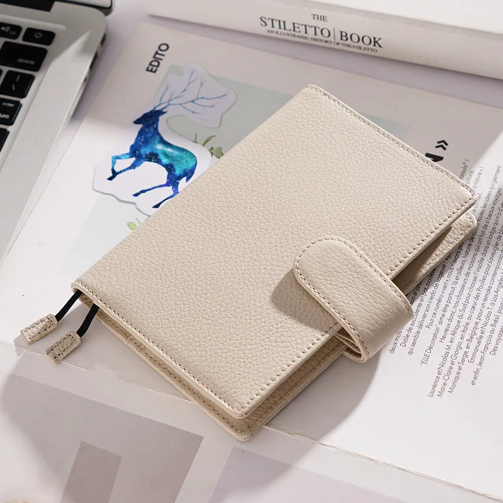 Lychee pattern cowhide leather notebook in A6 size with loose-leaf binding