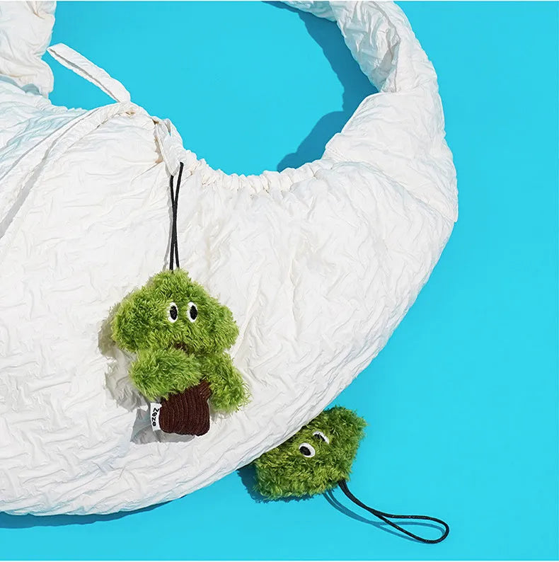 Pine wood cat toy bag pendant with jute hanging cord, filled with catnip.