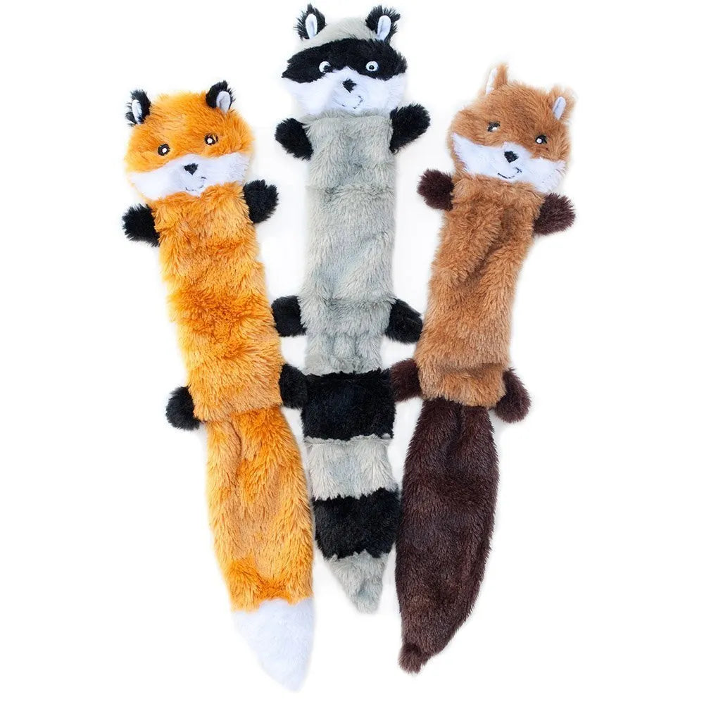 Brown plush dog toy with squeaker next to carrot-coloured version