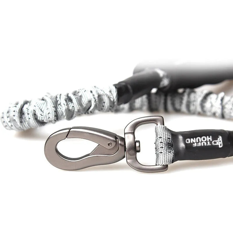 Grey adjustable nylon dog chest strap leash on a golden retriever, showing extended length settings