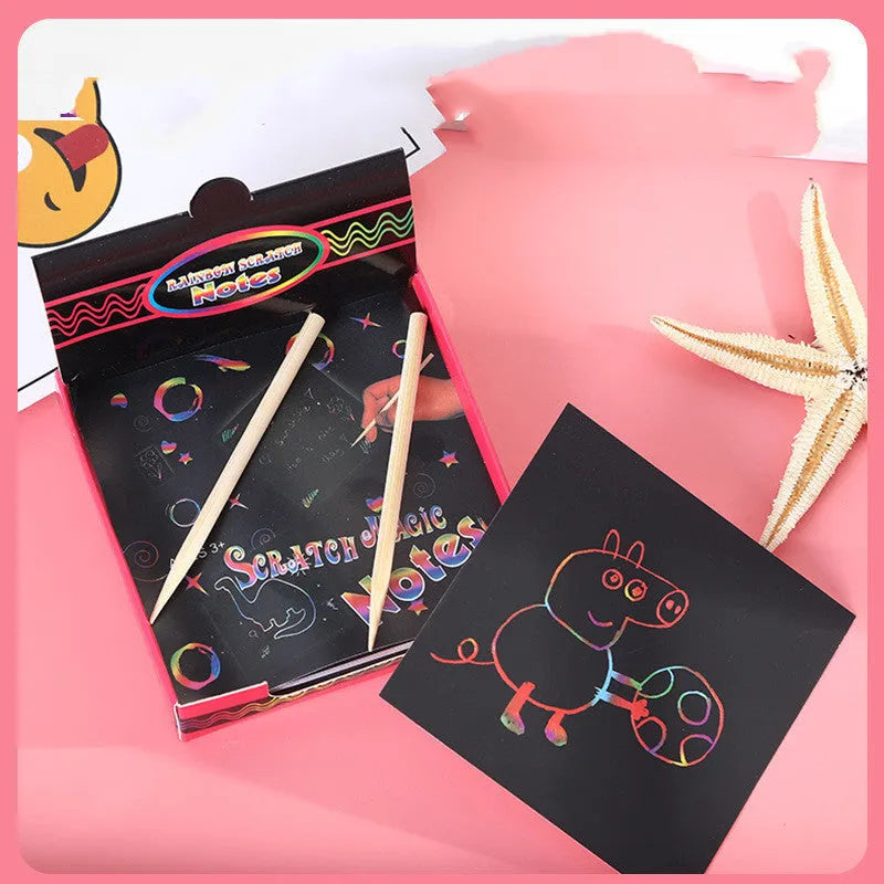 Scratch painting activity set showing colourful trumpet design on paper sheets in colour gift box