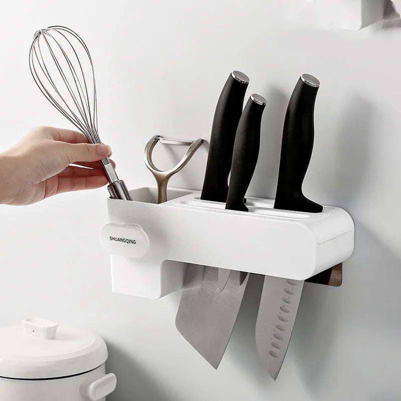 White plastic kitchen knife storage block with modern simple design on countertop