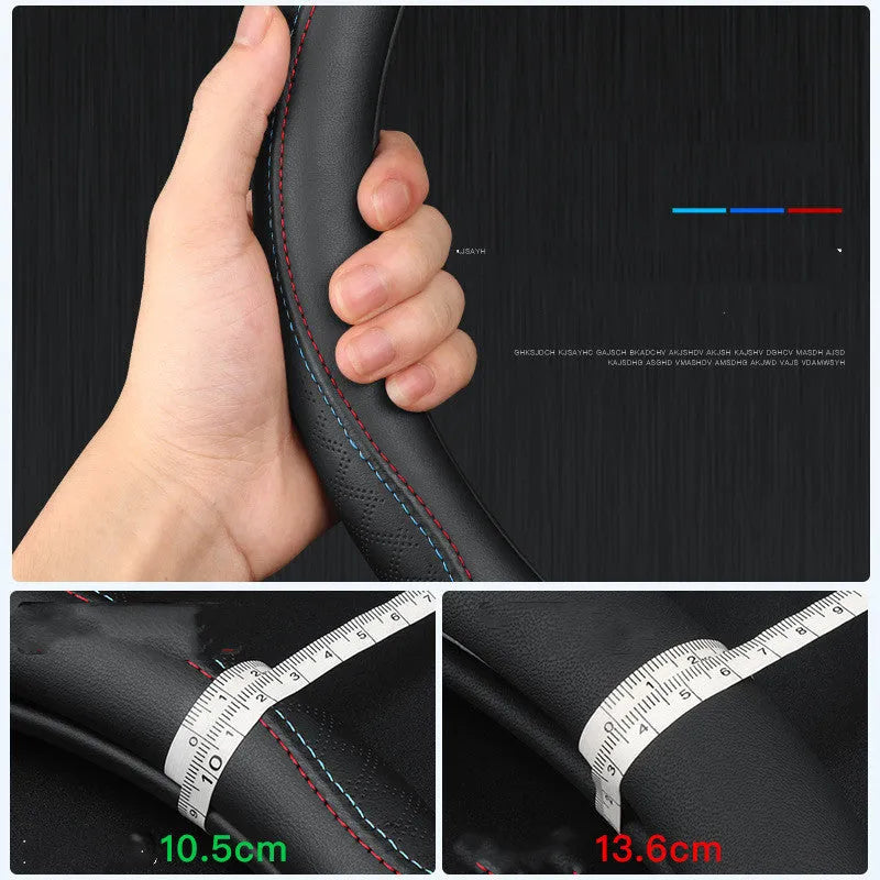 Black leather steering wheel cover with coloured stitching, shown fitted on a car wheel.
