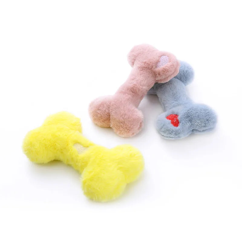 Cute plush love bone dog toy with a squeaker in blue, pink, and yellow colours.