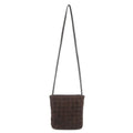 Cowhide leather barrel-shaped zip crossbody bag in black with weaving detail and crossbody strap