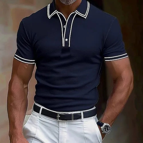 Man wearing a loose fit striped short-sleeved T-shirt in a casual setting