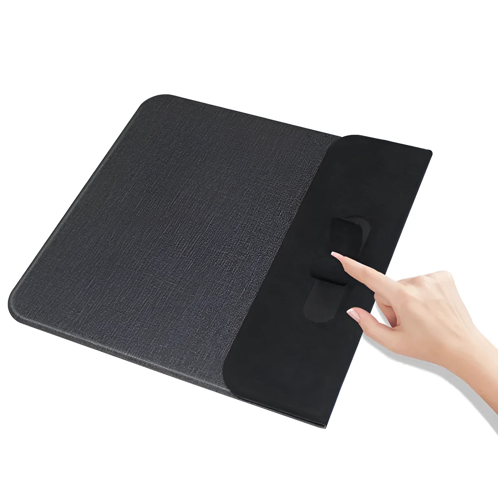 Foldable cloth phone holder with built-in wireless charging pad on a desk.