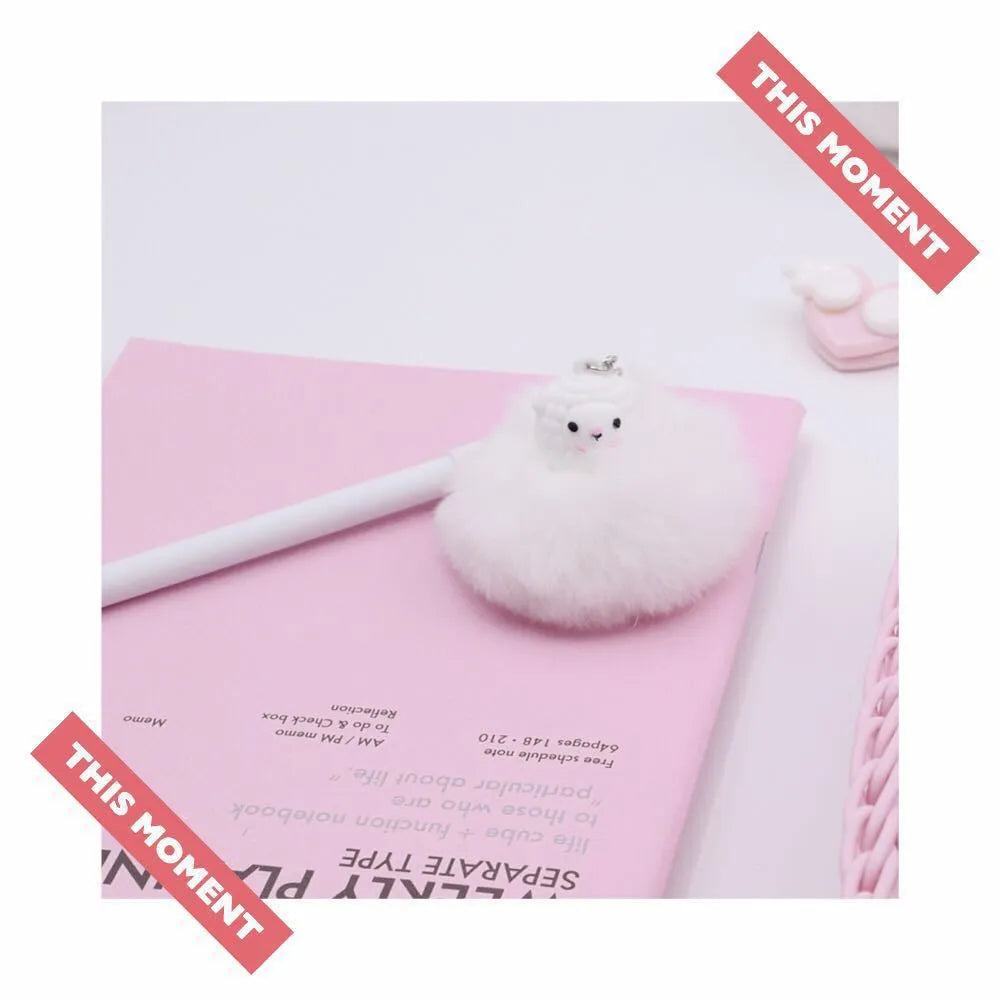 Alpaca hair ball pendant pen showing decorative pendant and 17cm length with 0.5mm tip