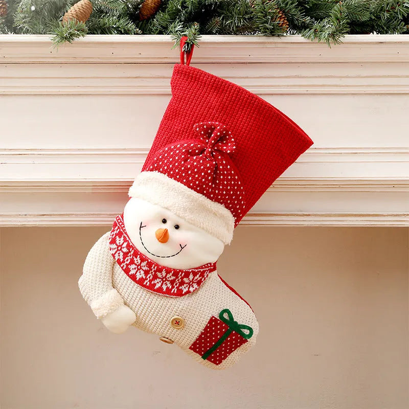 Large red white knitted Christmas stocking with Santa Claus design for fireplace decoration