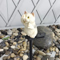 Brown or grey resin cat-shaped solar lawn light for garden and courtyard decoration.