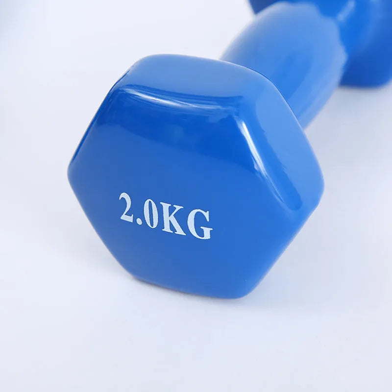 A set of bright red and blue plastic fitness dumbbells with a glossy, rubber-coated surface.