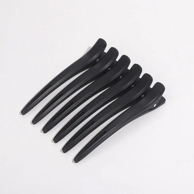 Electric hair styling comb with 31mm heat conductor and included heat spray and plastic clips