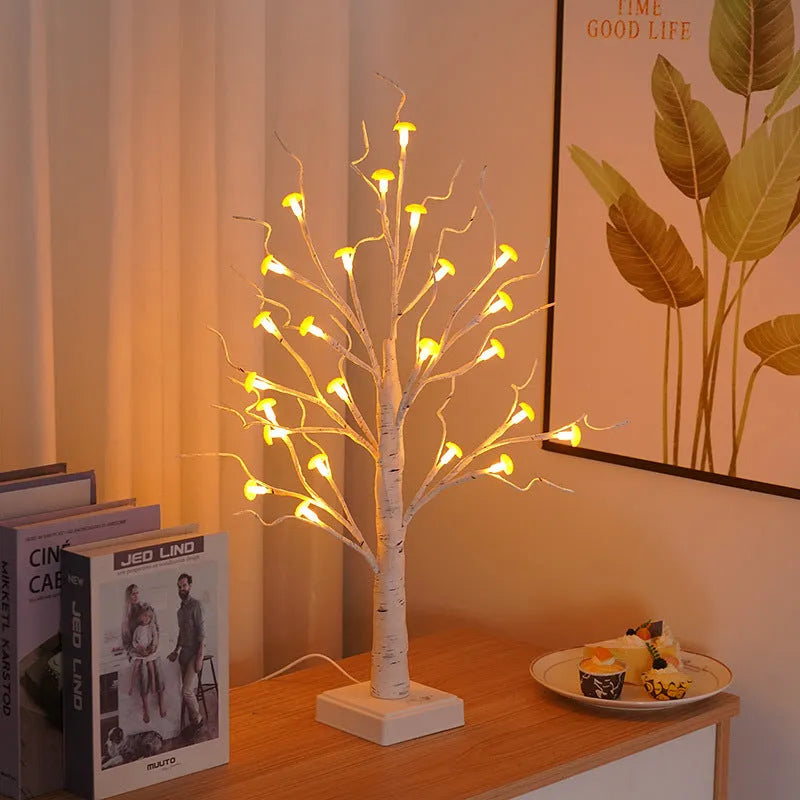 60cm tall white LED mushroom tree lamp with many small detachable mushroom flowers on a wooden table.