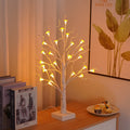 60cm tall white LED mushroom tree lamp with many small detachable mushroom flowers on a wooden table.