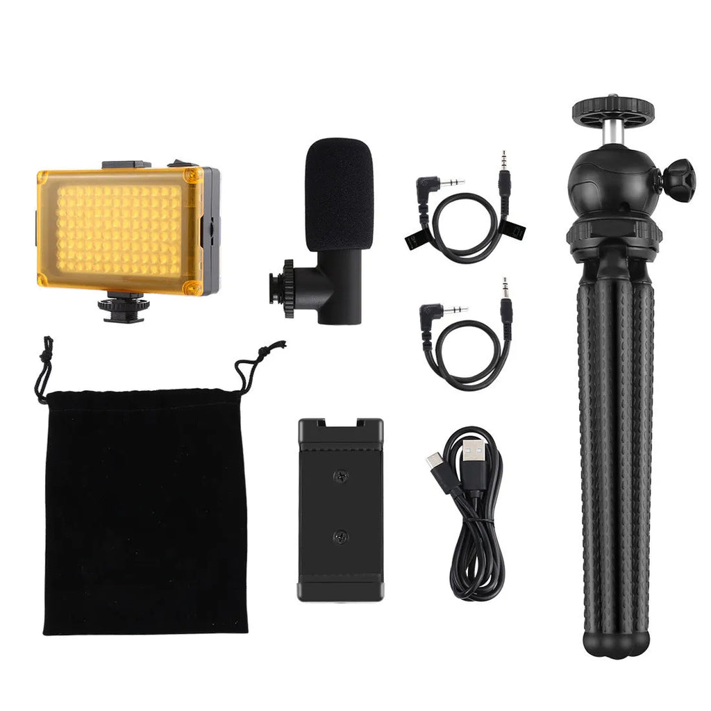 Octopus-style flexible tripod live broadcast kit with fill light and microphone accessories on a table