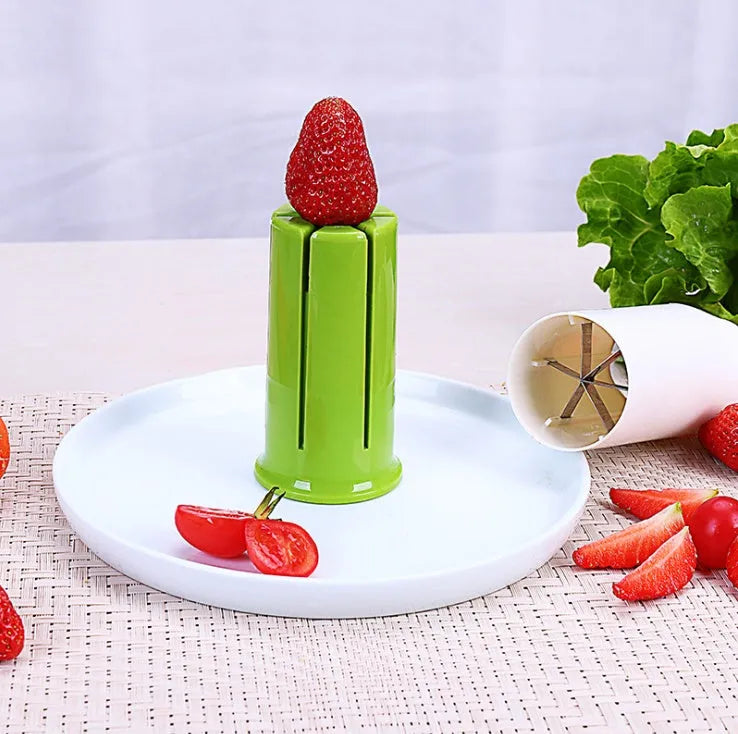 White vegetable cutter with stainless steel blades for slicing cucumbers carrots and strawberries
