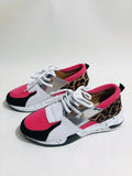 Women's suede casual flat sneakers with a wedge heel in leopard print.