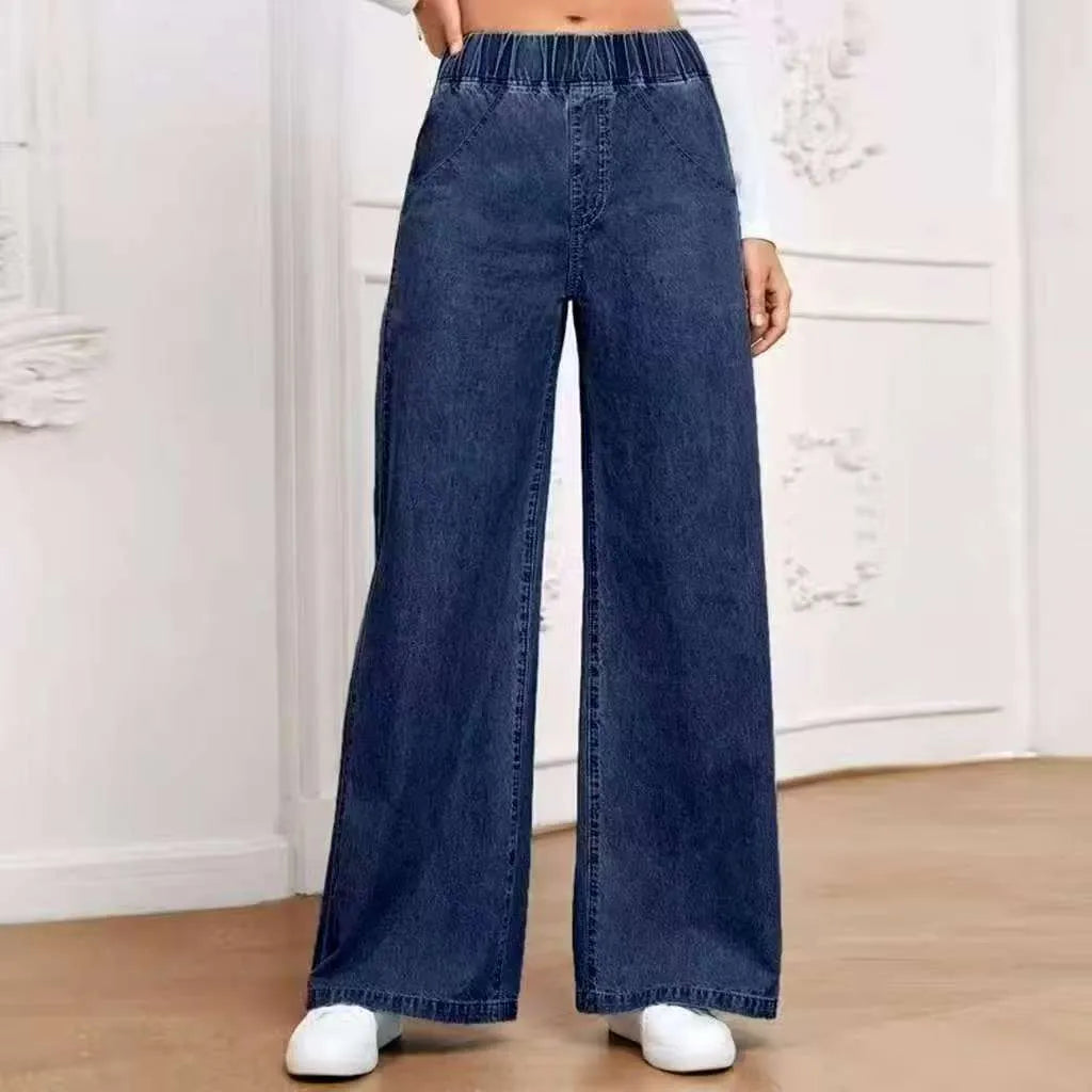 Plus size light blue washed denim wide-leg jeans with straight cut and mid-rise waist