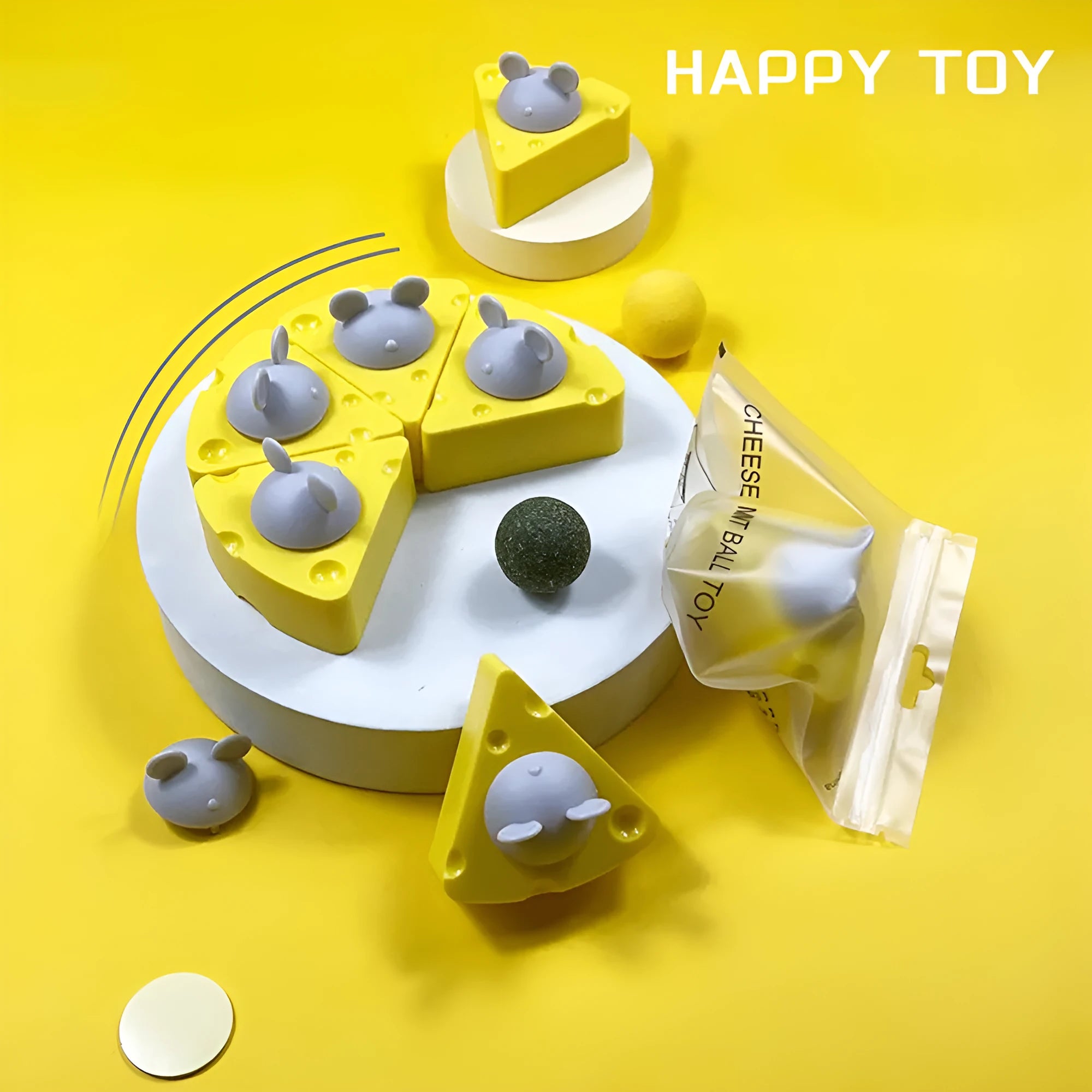 Yellow catnip and silvervine chew toy balls for cats on a plain background.