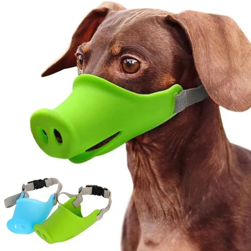 Green silicone anti-bite mouth cover muzzle for a long-mouthed dog on a white background.