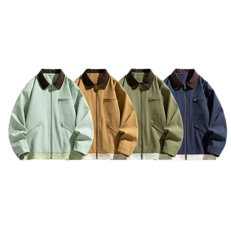 Man wearing a mint green loose-fit retro workwear jacket with dark contrast lapels and side pockets.