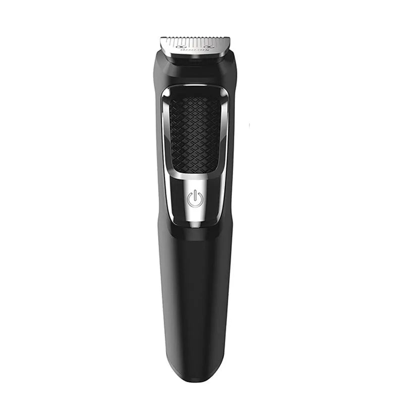 Rechargeable nose and beard hair clippers with a cleaning brush on a white background.
