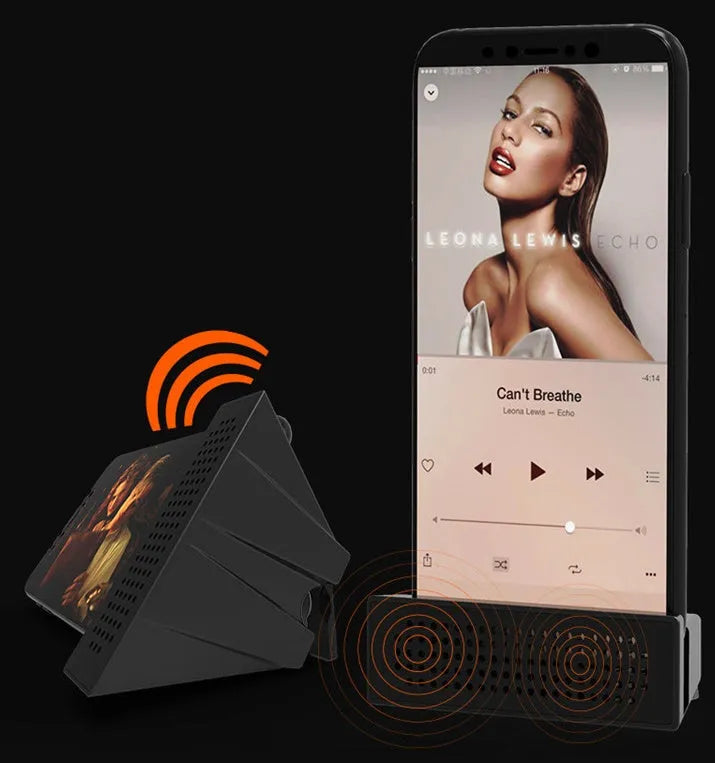 Portable black ABS mobile phone amplifier bracket holding an iPhone on a desk