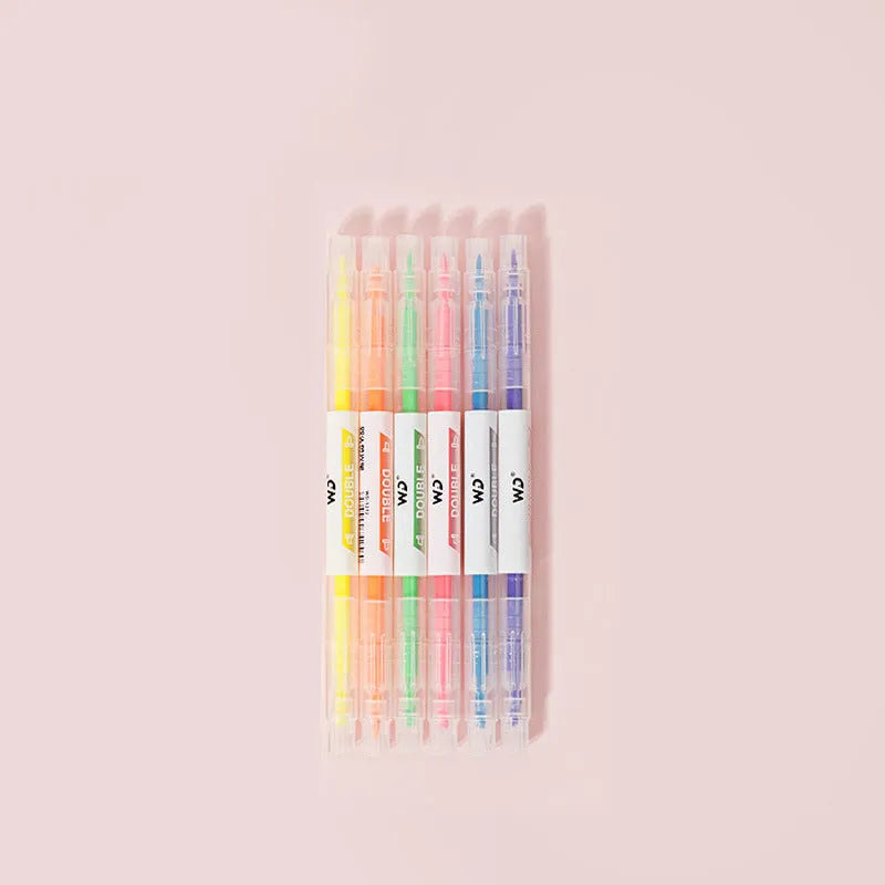 Set of six double-headed marker pens showing round and oblique tips in various colours