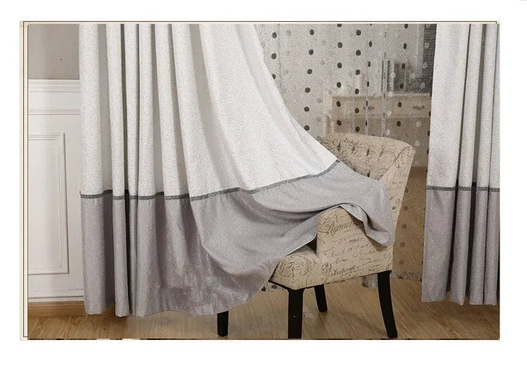 A single blackout curtain panel showing its polyurethane-backed fabric and one of the available hanging styles.