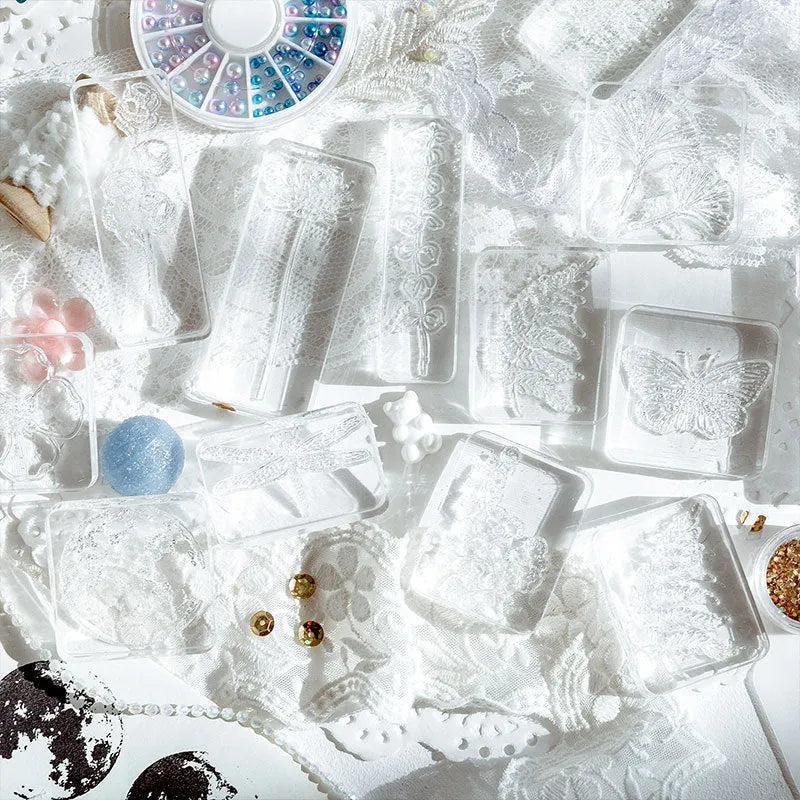 Transparent acrylic hand seal with silicone base showing Dragonfly and Fei Xue Fern colour pattern options