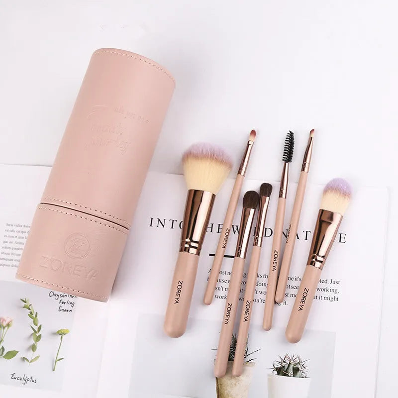 Daily makeup brush set with artificial fibre bristles and aluminium handles in black, brown, and pink