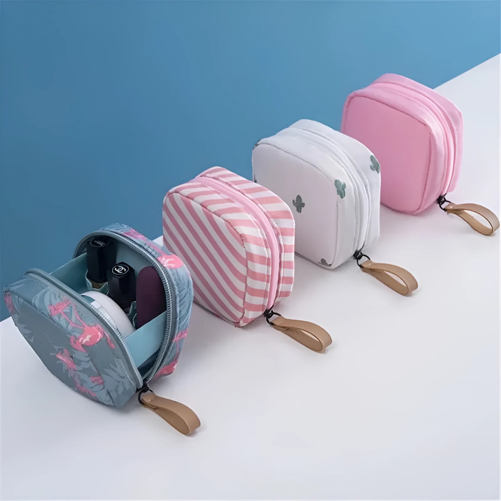 A blue cloth cube-shaped makeup storage bag on a table.