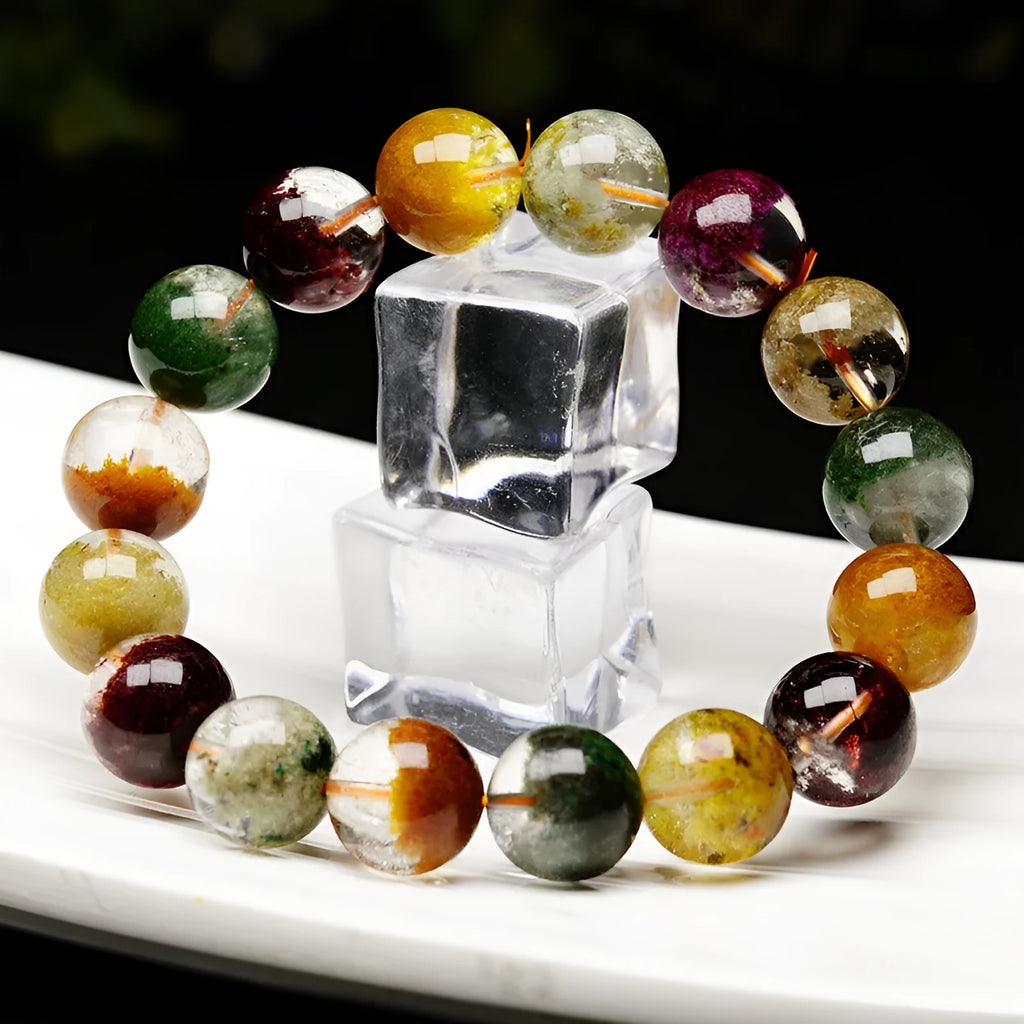 Crystal bracelet with 10mm beads showing colourful four seasons stones in ghost cornucopia ethnic design