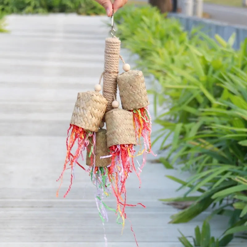 Colourful wood and sisal rope parrot foraging toy measuring 15cm by 35cm
