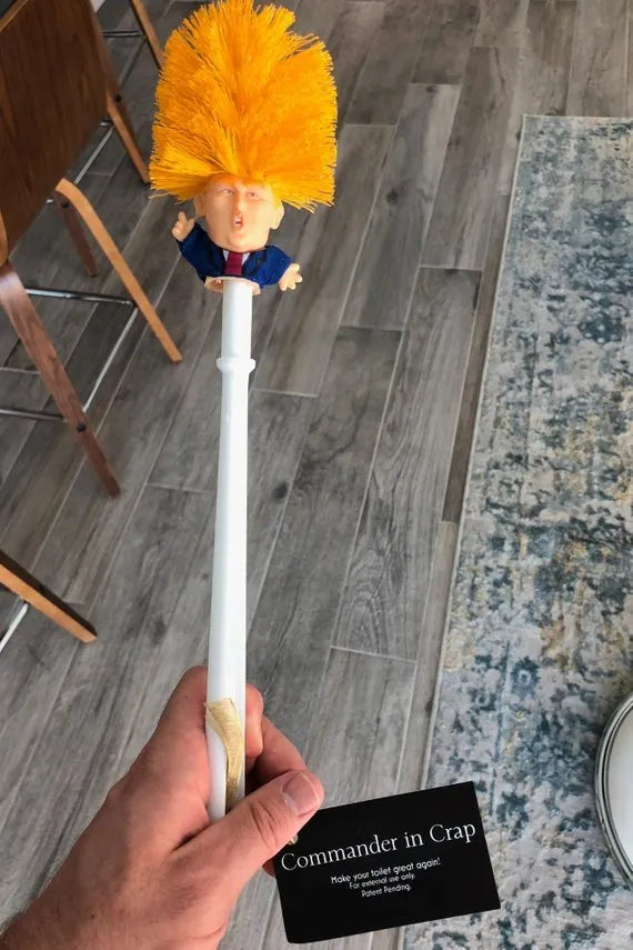 Yellow plastic Donald Trump toilet brush with 40cm length and hanging slot