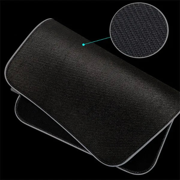 RGB illuminated mouse pad with non-slip rubber base and cloth surface in black