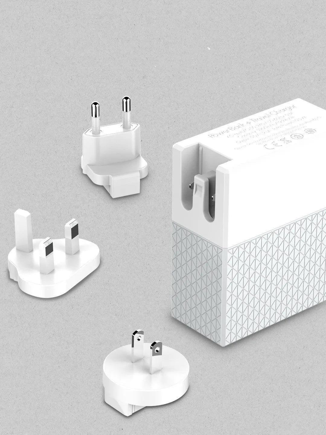 White mobile power bank charger with integrated plug showing UK, US and EU plug options