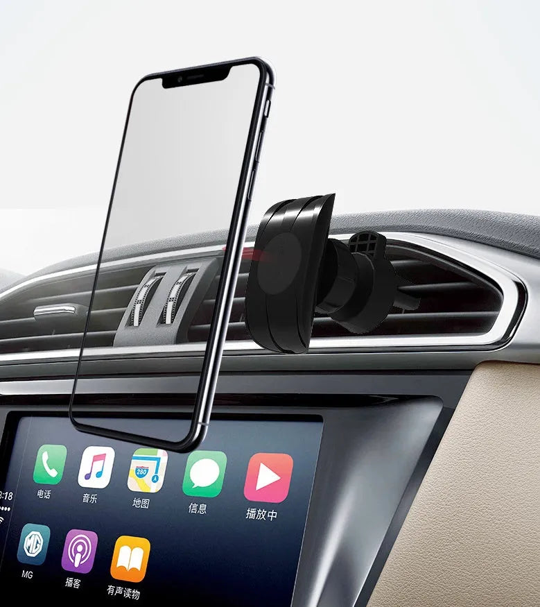 Black car phone holder mounted on vehicle air vent showing smartphone placement
