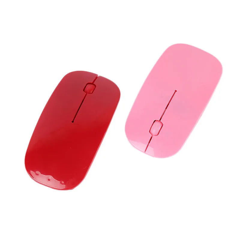 Wireless USB computer mouse available in six colours: black, blue, green, pink, red, and white