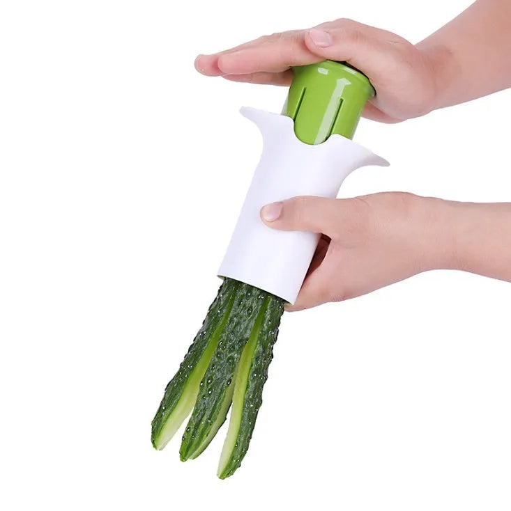 White vegetable cutter with stainless steel blades for slicing cucumbers carrots and strawberries