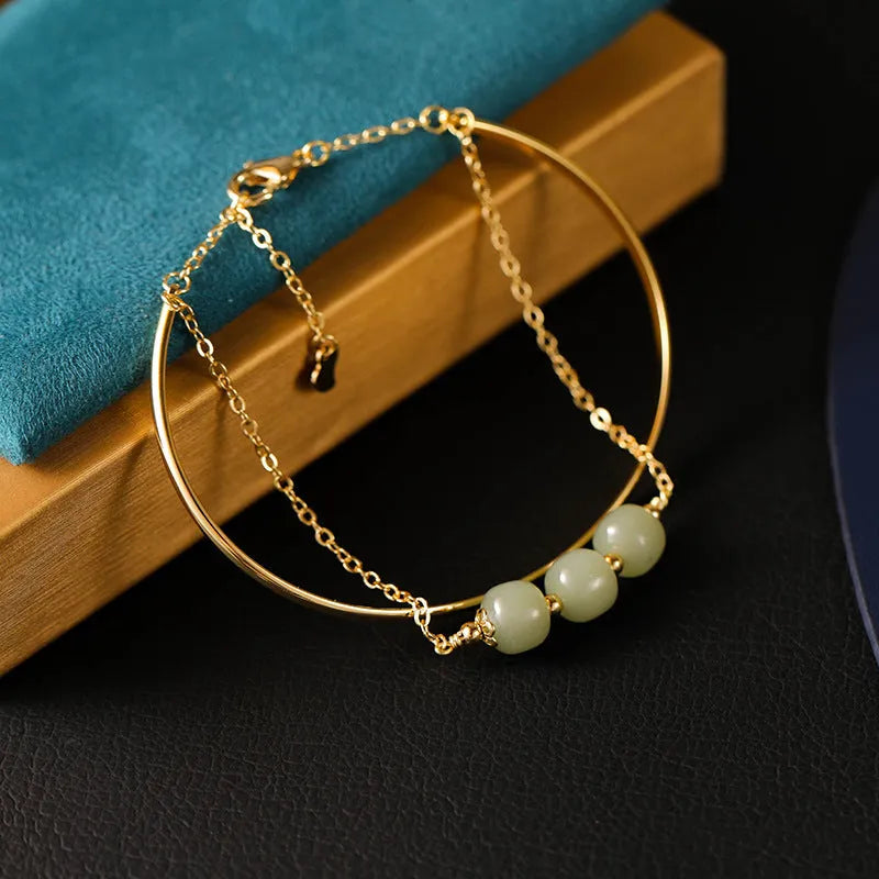 Hetian jade lucky beads bracelet with gold inlay treatment in women's fake two pieces style