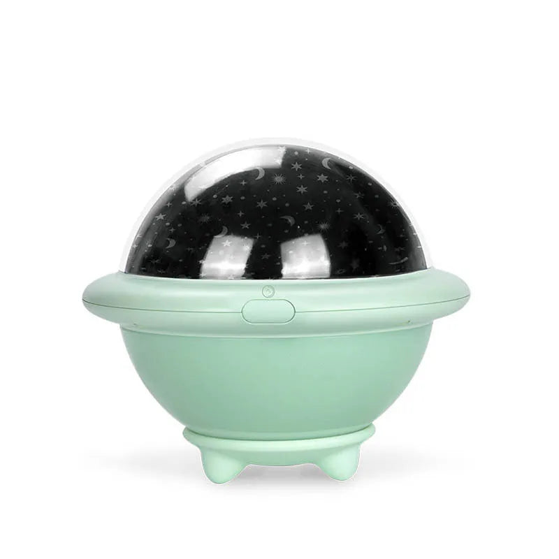 UFO-shaped starry sky projection night light in pink colour showing star projection effect