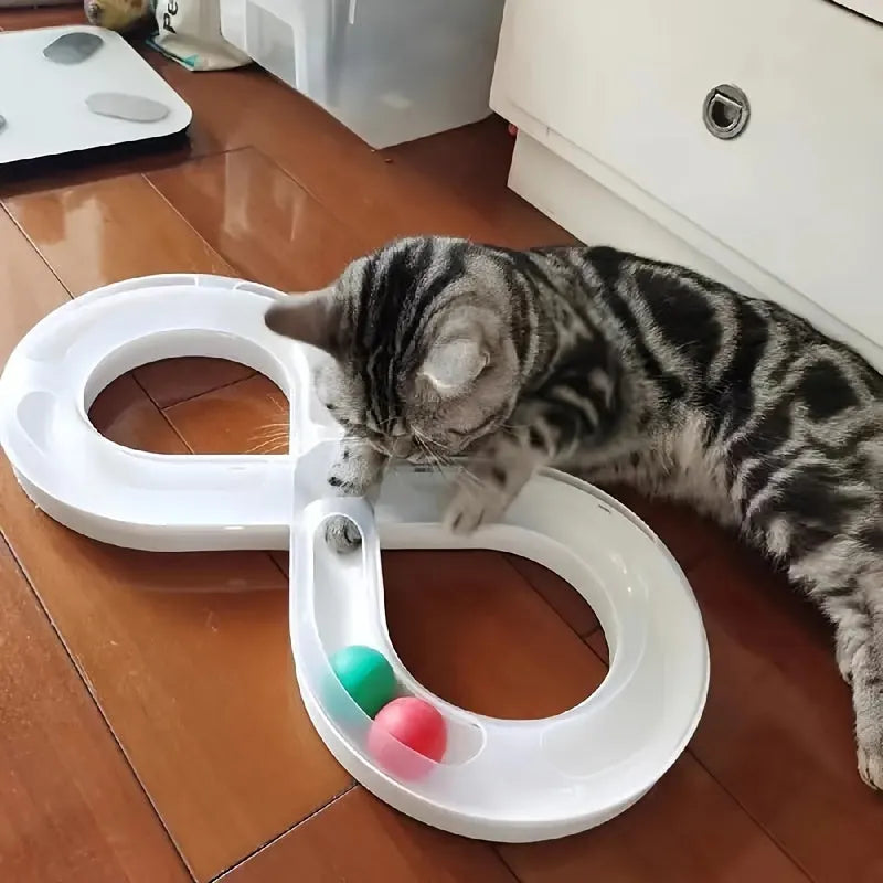 Blue and white cat activity centre with spinning track, ball, and teaser stick