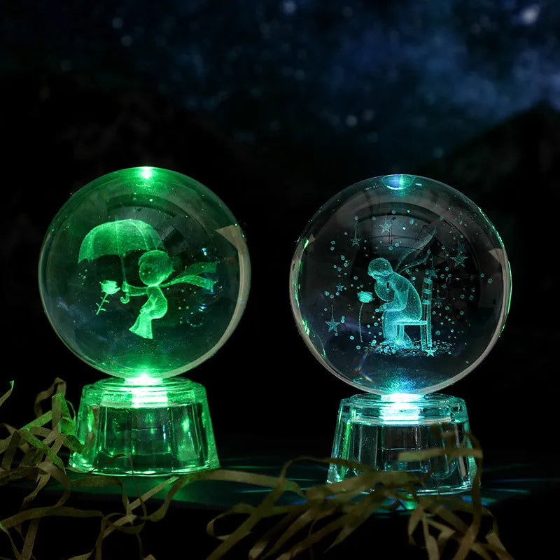 Transparent luminous crystal ball ornament with inner carvings on fixed base for desktop decoration