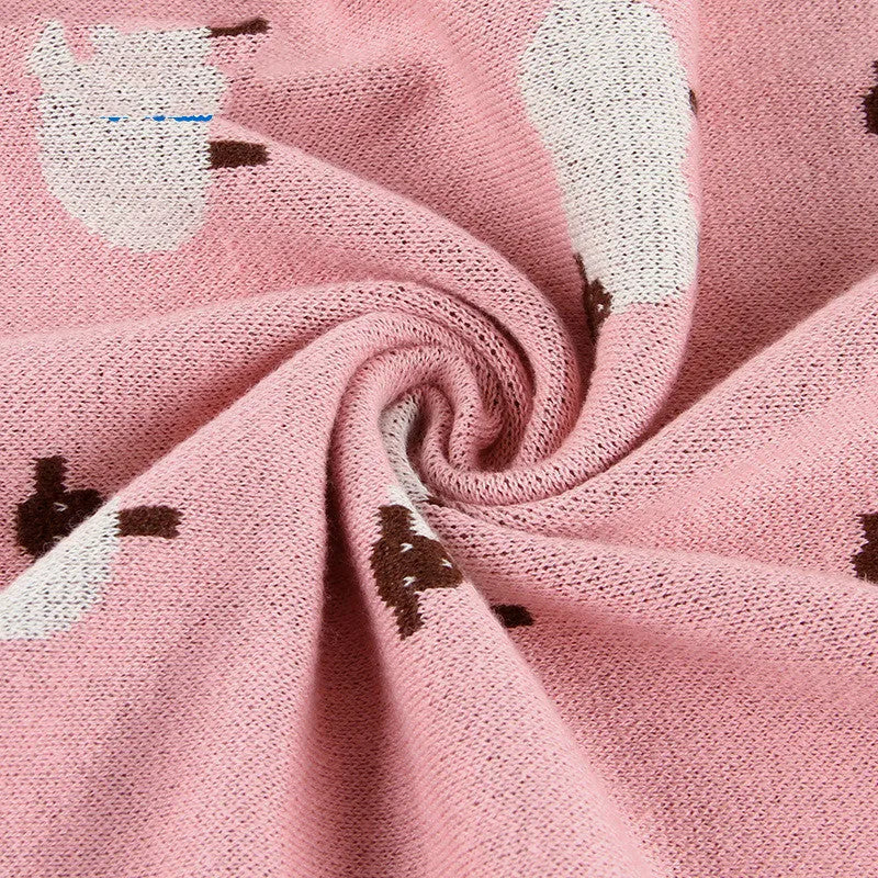 100x80cm grey and pink baby sheepskin blanket made from 100% cotton fabric laid flat.