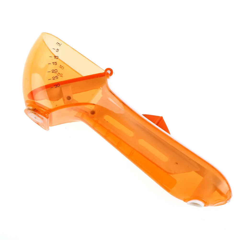 Orange and blue digital measuring spoons with magnetic base and measurement markings.