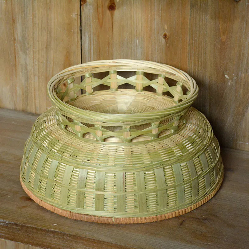 Handmade natural bamboo storage basket with open weave design in three size variations